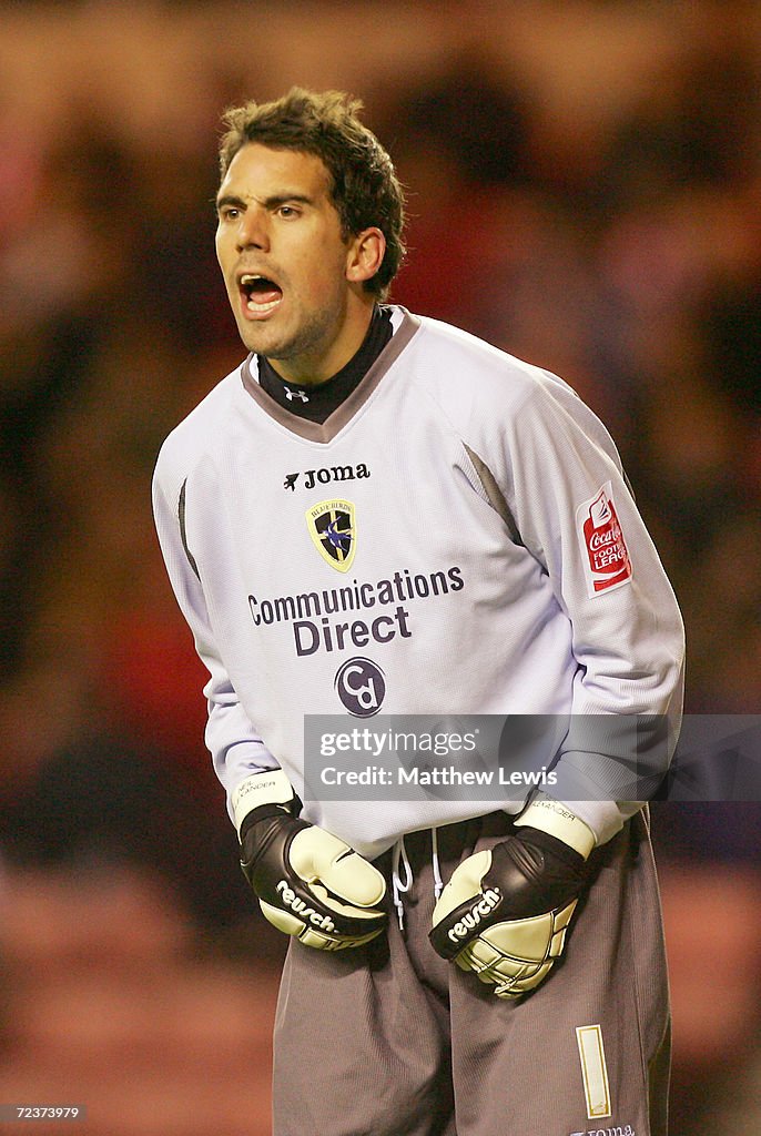 Alexander Ridd Cardiff Neil Alexander of Cardiff City shouts during the Coca-Cola... News ...