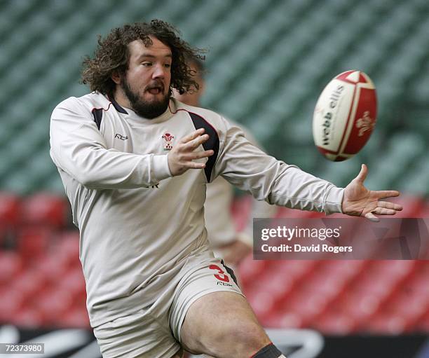 Adam Jones, the Wales prop passes the ball during the Welsh rugby union training session at the Millennium Stadium on November 3, 2006 in Cardiff,...