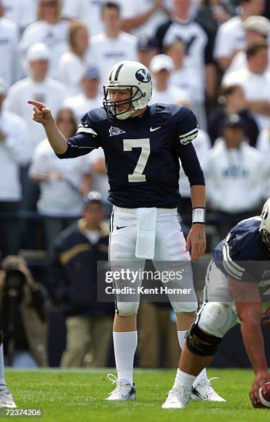 Quarterback Jason Beck of the Brigham Young Cougars calls a play prior to snapping the ball against the Utah State Aggies on September 23, 2006 at La...