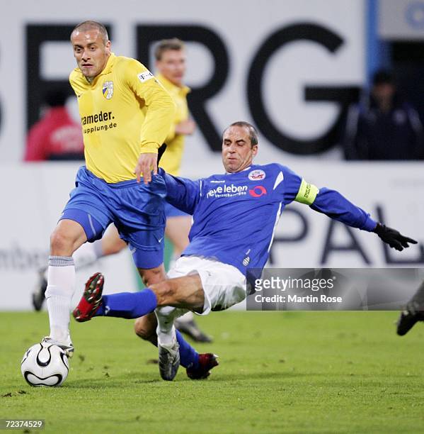 Stefan Beinlich of Rostock tries to stop Patrick de Napoli of Jena during the Second Bundesliga match between Hansa Rostock and Carl Zeiss Jena at...