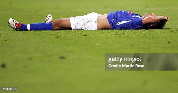 Marcel Schied of Rostock lies on the pitch after he fails to score during the Second Bundesliga match between Hansa Rostock and Carl Zeiss Jena at...