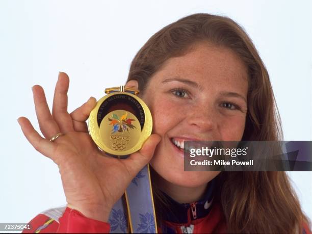 Picabo Street of the USA with her gold medal from the womens Super G during the 1998 Winter Olympic Games in Nagano, Japan. Mandatory Credit: Mike...