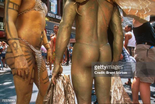 Participants wear body paint during the Gay Pride Parade June 27, 1999 in New York City. The Gay Pride Parade is organized for and on behalf of all...