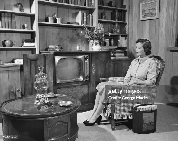 1950s: Woman watching TV .