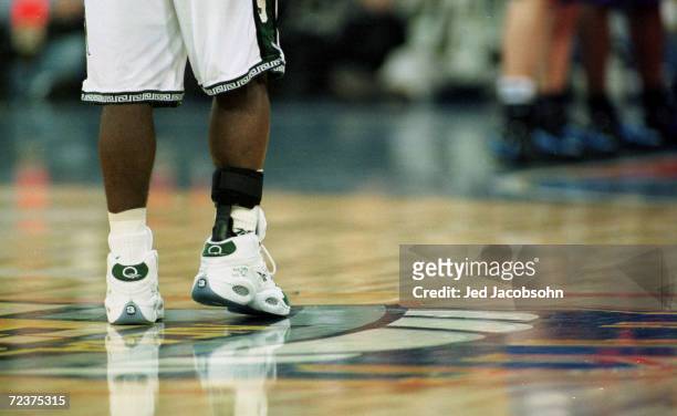 The ankle of Mateen Cleaves of Michigan State is shown wrapped in a brace during the final round of the NCAA Men''s Final Four against Florida at the...