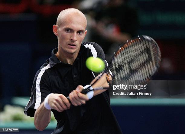 Nikolay Davydenko of Russia plays a backhand in his match against Mario Ancic of Croatia in the quarter finals during day five of the BNP Paribas ATP...