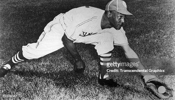 Buck O'Neill, first baseman and manager of the Kansas City Monarchs. Shows off his stretch in a 1950 photograph.