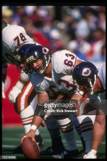Center Jay Hilgenberg of the Chicago Bears prepares to snap the ball during a game against the Buffalo Bills at Rich Stadium in Orchard Park, New...