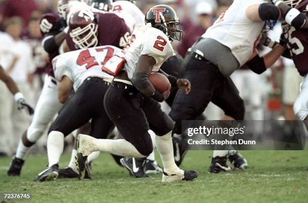 Ricky Williams of Texas Tech Red Raiders runs with the ball during the game against Texas A&M Aggies at Kyle Field in College Station, Texas. Texas...