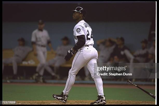 Ken Griffey Jr. Of the Seattle Mariners follows his home run as he goes to base during the game against the New York Yankees in the American League...
