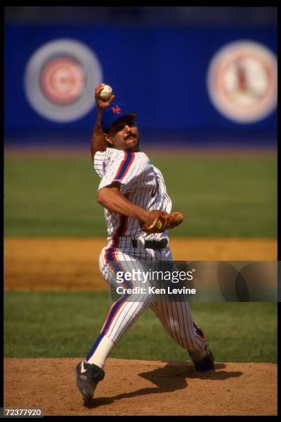 Left-handed pitcher John Franco of the New York Mets winds up to deliver a pitch to a batter of the Pittsburgh Pirates at Shea Stadium in New York,...