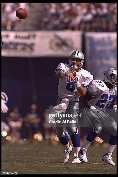 Quarterback Troy Aikman of the Dallas Cowboys throws a pass during their game against the San Diego Chargers at Jack Murphy Stadium in San Diego,...