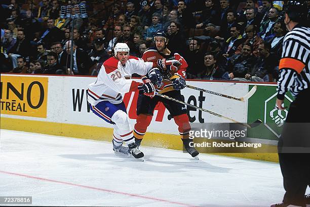 Scott Lachance of the Montreal Canadiens fights for position during a game against the Florida Panthers at the Molson Centre in Montreal, Canada. The...