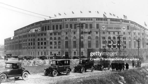 It is opening day for Yankee Stadium, first day of operation on April 18 as cars and fans approach the gates.