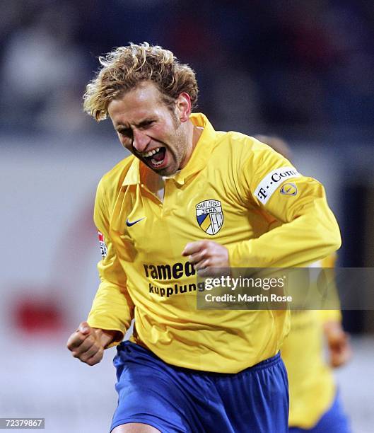 Holger Hasse of Jena celebrates after he scores the 1st goal during the Second Bundesliga match between Hansa Rostock and Carl Zeiss Jena at the...