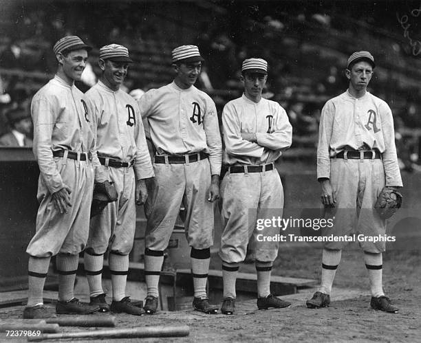 The Philadelphia Athletics $100,000. Infield poses together in 1911 in Shibe Park. They are Stuffy McInnis, Danny Murphy, Frank "Home Run" Baker,...