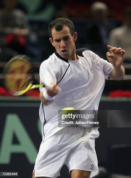 Dominik Hrbaty of Slovakia plays a forehand in his match against Tomas Berdych of Czech Republic in the quarter finals during day five of the BNP...
