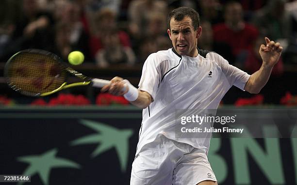 Dominik Hrbaty of Slovakia plays a forehand in his match against Tomas Berdych of Czech Republic in the quarter finals during day five of the BNP...