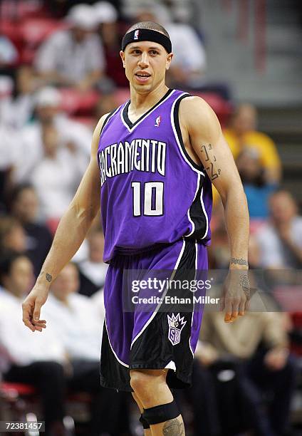 Mike Bibby of the Sacramento Kings walks onto the court at the start of a preseason game against the Los Angeles Lakers at the Thomas & Mack Center...