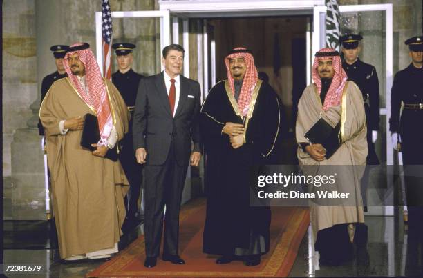 President Ronald Reagan with Saudi King Fahd, Princes Bander & Saud, at WH portico.