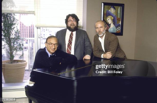 Group portrait around piano of photographer, David Hume Kennerly , playwright Neil Simon and Time theater critic William A. Henry III.