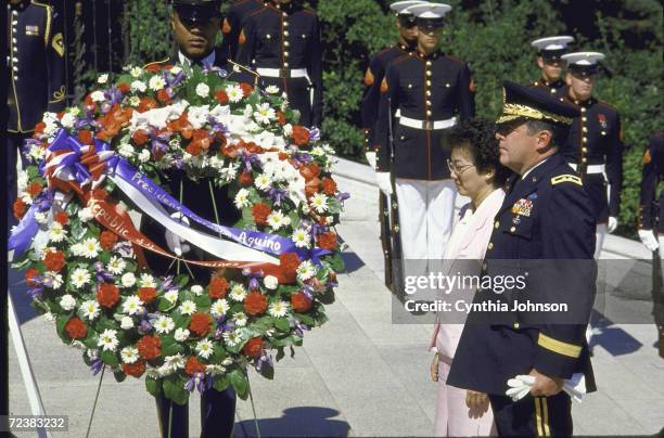 Philippines President Cory Aquino during wreath laying at Tomb of Unknown Soldier at Arlington Cemetery.