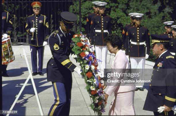 Philippines President Cory Aquino during wreath laying at Tomb of Unknown Soldier at Arlington Cemetery.