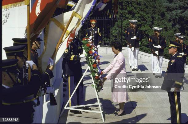 Philippines President Cory Aquino during wreath laying at Tomb of Unknown Soldier at Arlington Cemetery.