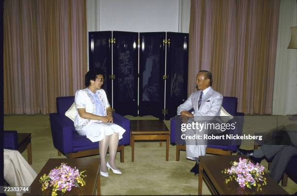 Philippine President Corazon Aquino during visit to Singapore meeting with President Wee Kim Wee.