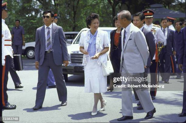 Philippine President Corazon Aquino during visit to Singapore meeting with President Wee Kim Wee.