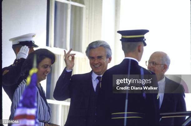 Soviet ambassador Yuri Dubinin and wife leaving the White House after presenting credentials.