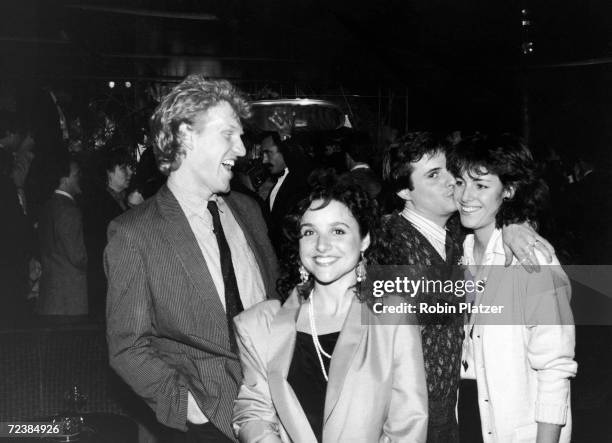 Stars from TV's "Saturday Night Live" Brad Hall, Julia Louis-Dreyfus & Gary Kroeger with unidentified at a party for Paul McCartney.