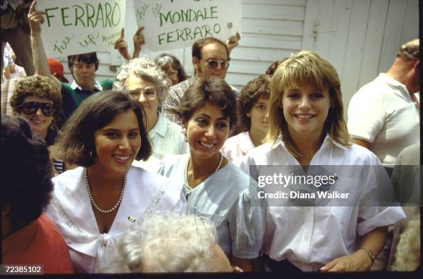 Eleanor Mondale standing with Laura & Donna Zaccaro, daughters of her father's running mate, in crowd during Mondale visit to his hometown.