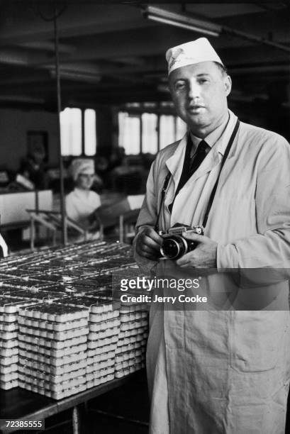 Photographer Jerry Cooke at a Czech candy factory.
