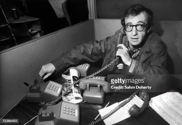 Filmaker & comedian Woody Allen volunteering at Democratic HQ for Jimmy Carter.