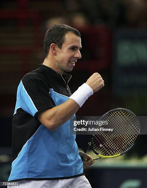 Dominik Hrbaty of Slovakia celebrates defeating Tomas Berdych of Czech Republic in the quarter finals during day five of the BNP Paribas ATP Tennis...