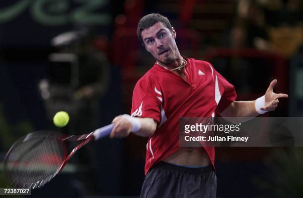 Marat Safin of Russia plays a forehand in his match against Tommy Haas of Germany in the quarter finals during day five of the BNP Paribas ATP Tennis...