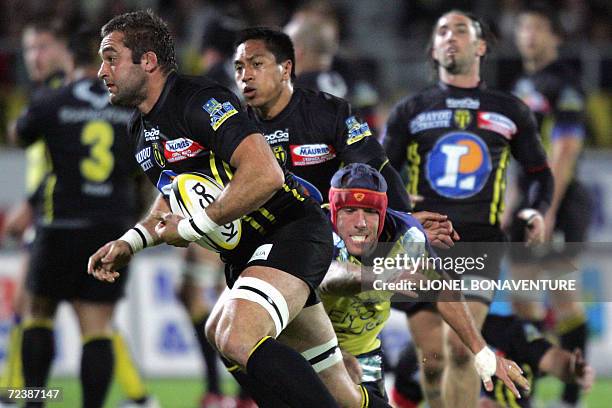 Albi's lock Arnaud Mela vies with Clermont's flanker Alexandre Audebert during their French Top 14 rugby union match Albi vs Clermont, 03 November...