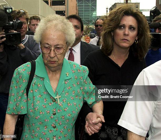 Andrea Yates'' mother, Jutta Kennedy, walks to the Harris County Courthouse with her daughter, Michelle Freeman, for the sentencing phase of the...