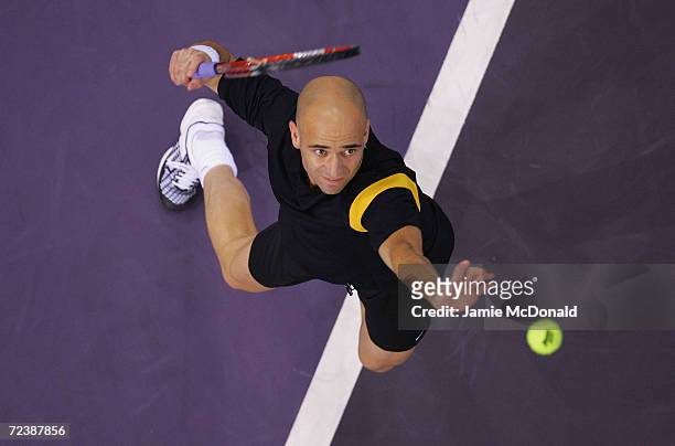 Andre Agassi of USA serves during his semi final match against Marat Safin of Russia during the ATP Madrid Masters at the Nuevo Rockodromo on October...