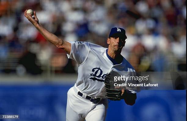 Kevin Brown of the Los Angeles Dodgers throws the ball during the game against the Colorado Rockies at the Dodgers Stadium in Los Angeles,...
