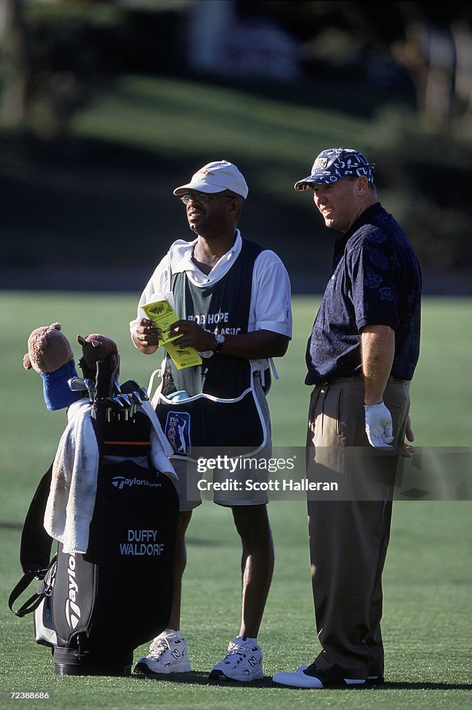 Duffy Waldorf stands with his caddie