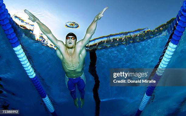 Ed Moses swims in the Men's 100M Breaststroke Final at the Janet Evans Invitational on June 13, 2004 in Long Beach, California.