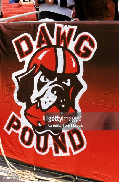 Dawg Pound " sign hangs on a rail during a game between the New England Patriots and the Cleveland Browns at the Cleveland Stadium in Cleveland,...