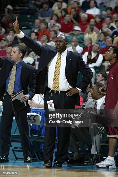 Head coach Steve Robinson of Florida State directs his tam against Maryland during the ACC Tournament game at the Charlotte Coliseum in Charlotte,...