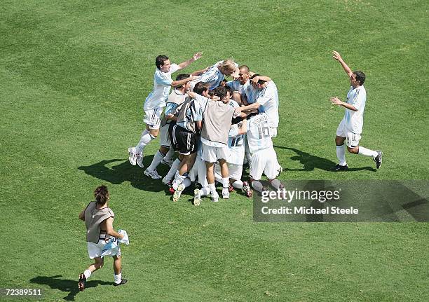 Players from Argentina celebrate after winning the Gold medal after they beat Paraguay 1-0 in the men's football gold medal match between Argentina...