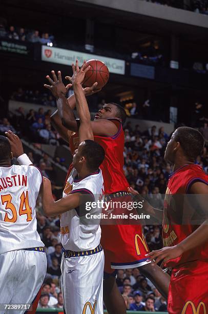 Alton Ford of Team West takes a shot during the McDonalds High School All - American game against Team East at The Fleet Center in Boston,...