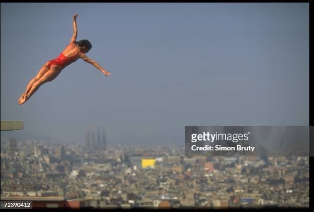 View of a female diver as she dives at the Olympic Park in a competetion before the Olympic games, Barcelona, Spain.