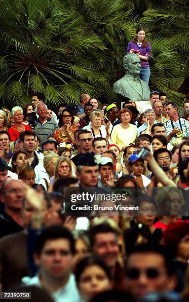 General view is seen of fans attempting to catch a glimps of the arrivals of the "2046" Premiere at Le Palais de Festival at the 57th Cannes Film...