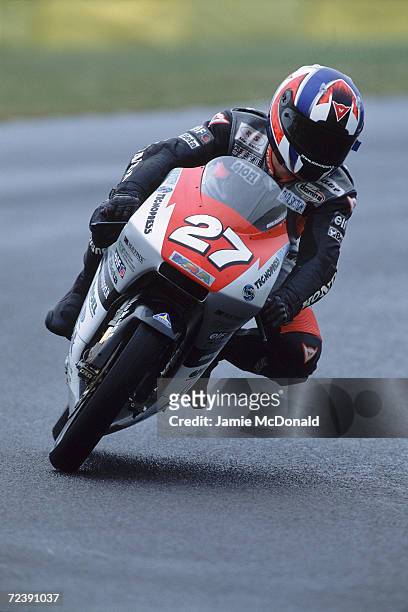 Marco Petrini of Italy puts his Racing service Team Bike through its paces during the 125cc Class British Grand Prix held at Donigton Park Race Track...